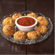 Fried Momos in Butter Creamy Sauce